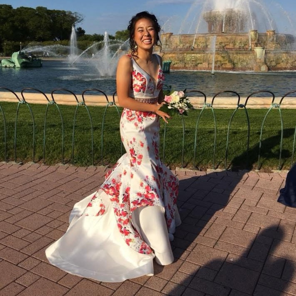 White formal gown with pink floral pattern and unique two layer skirt